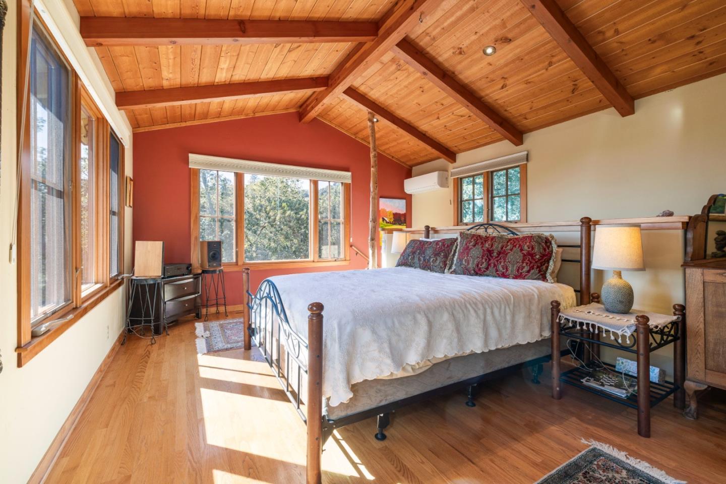 4710 North Rodeo Gulch Road Soquel, CA 95073 - Photo 25 of 97 a spacious bedroom with a bed and a large window