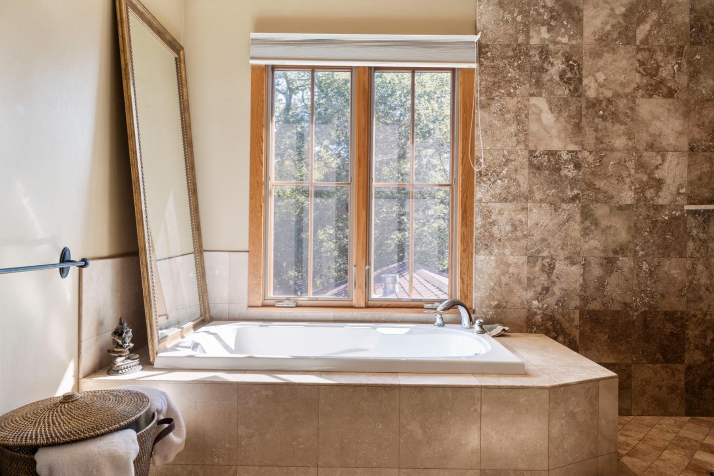 4710 North Rodeo Gulch Road Soquel, CA 95073 - Photo 29 of 97 a bathroom with a bathtub and next to a window