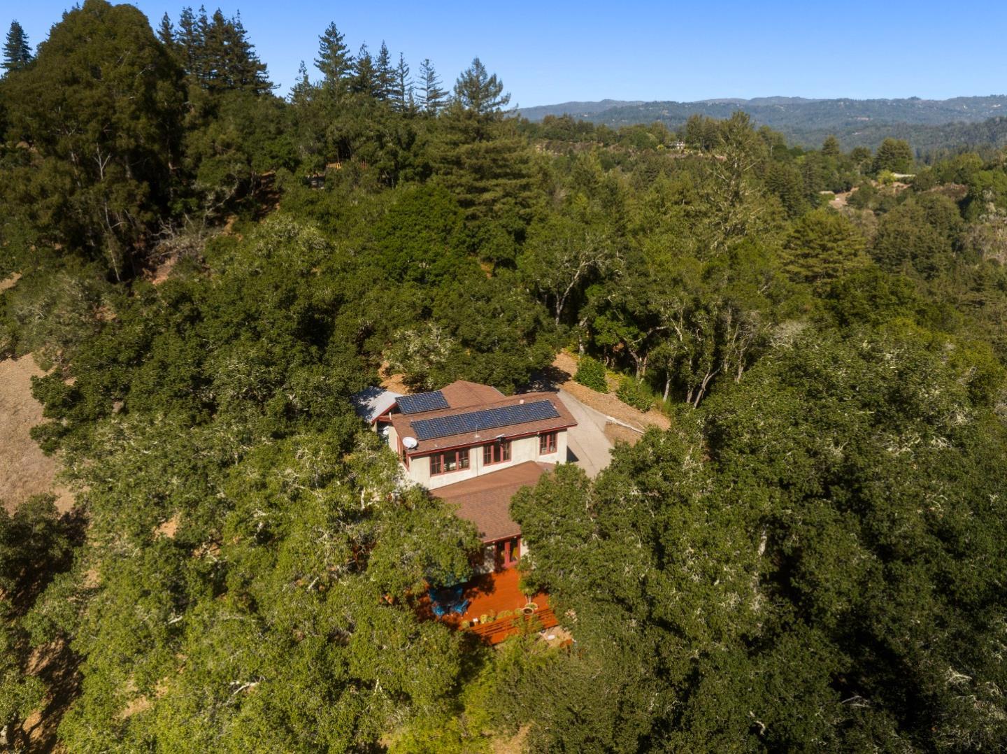 4710 North Rodeo Gulch Road Soquel, CA 95073 - Photo 56 of 97 an aerial view of a house with a yard