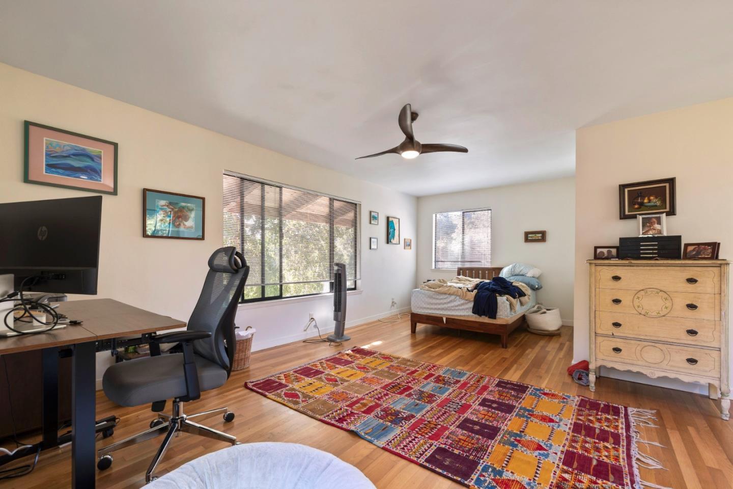 4710 North Rodeo Gulch Road Soquel, CA 95073 - Photo 71 of 97 a living room with furniture a rug and a flat screen tv