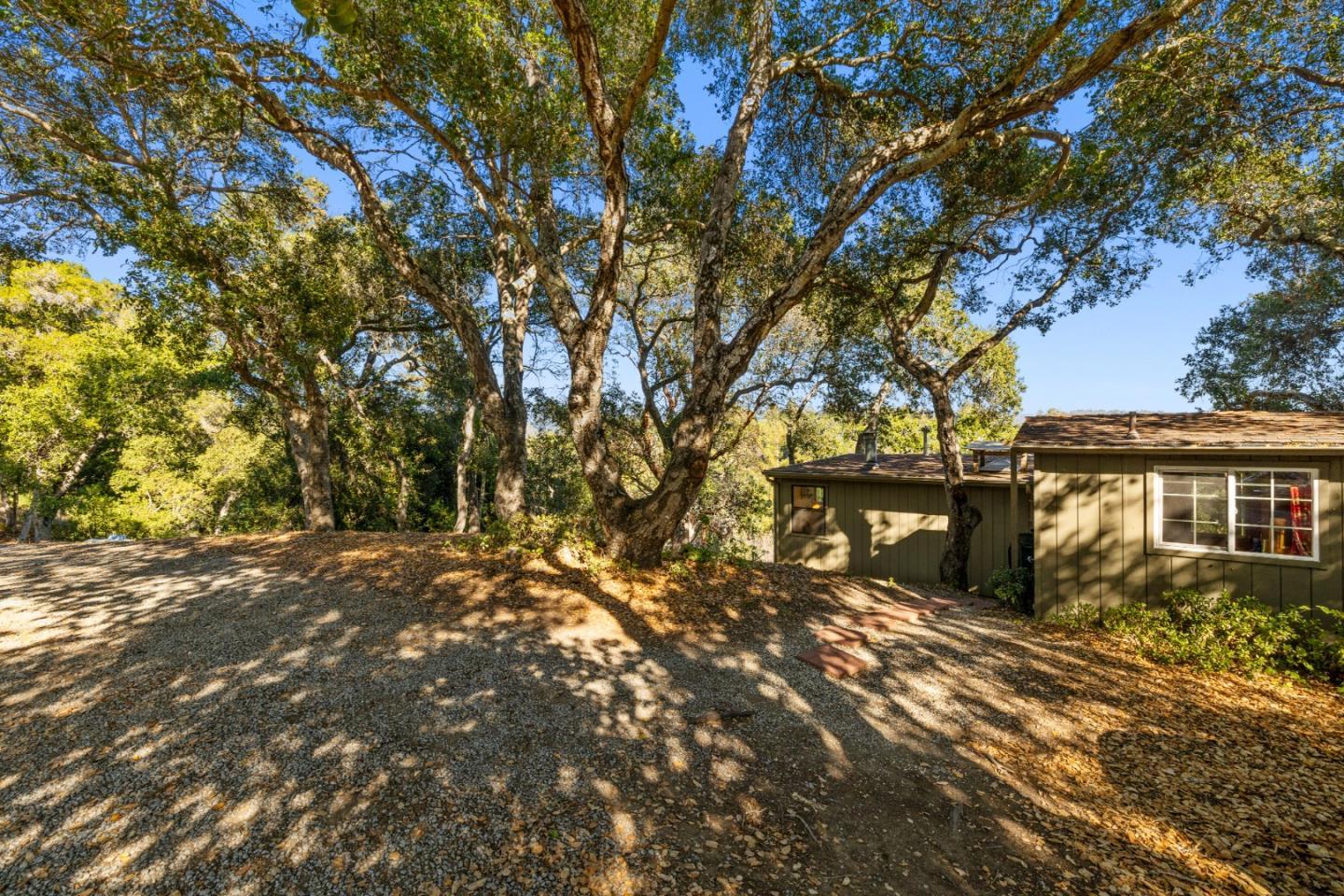4710 North Rodeo Gulch Road Soquel, CA 95073 - Photo 79 of 97 a backyard of a house with lots of green space