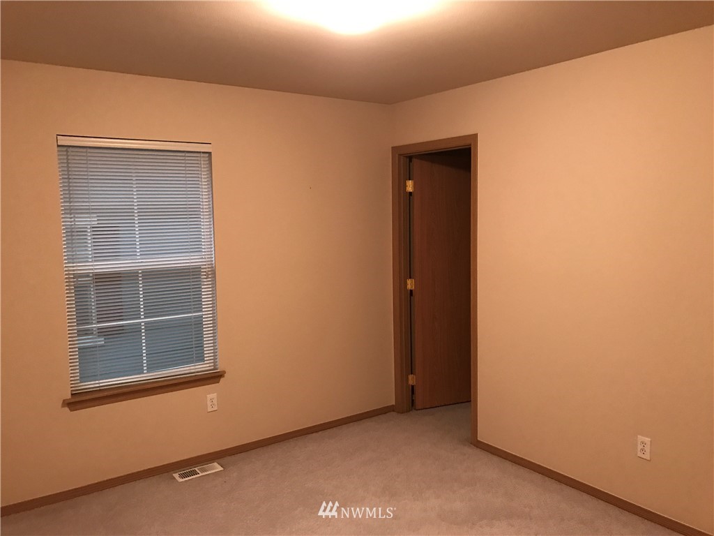 2226 Southeast 2nd Place Renton, WA 98056 - Photo 15 of 20 a view of empty room with windows