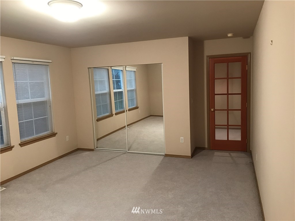 2226 Southeast 2nd Place Renton, WA 98056 - Photo 17 of 20 an empty room with windows