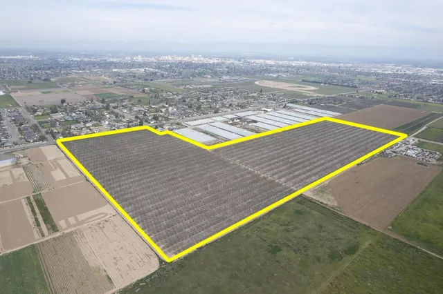 a view of a swimming pool with an ocean view
