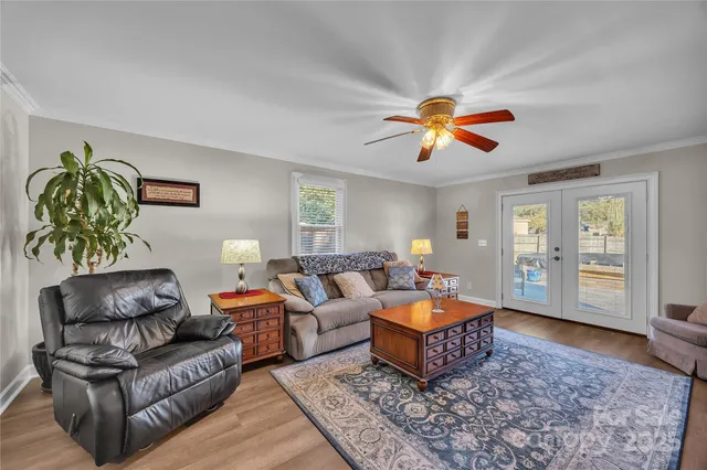 a living room with furniture and a rug