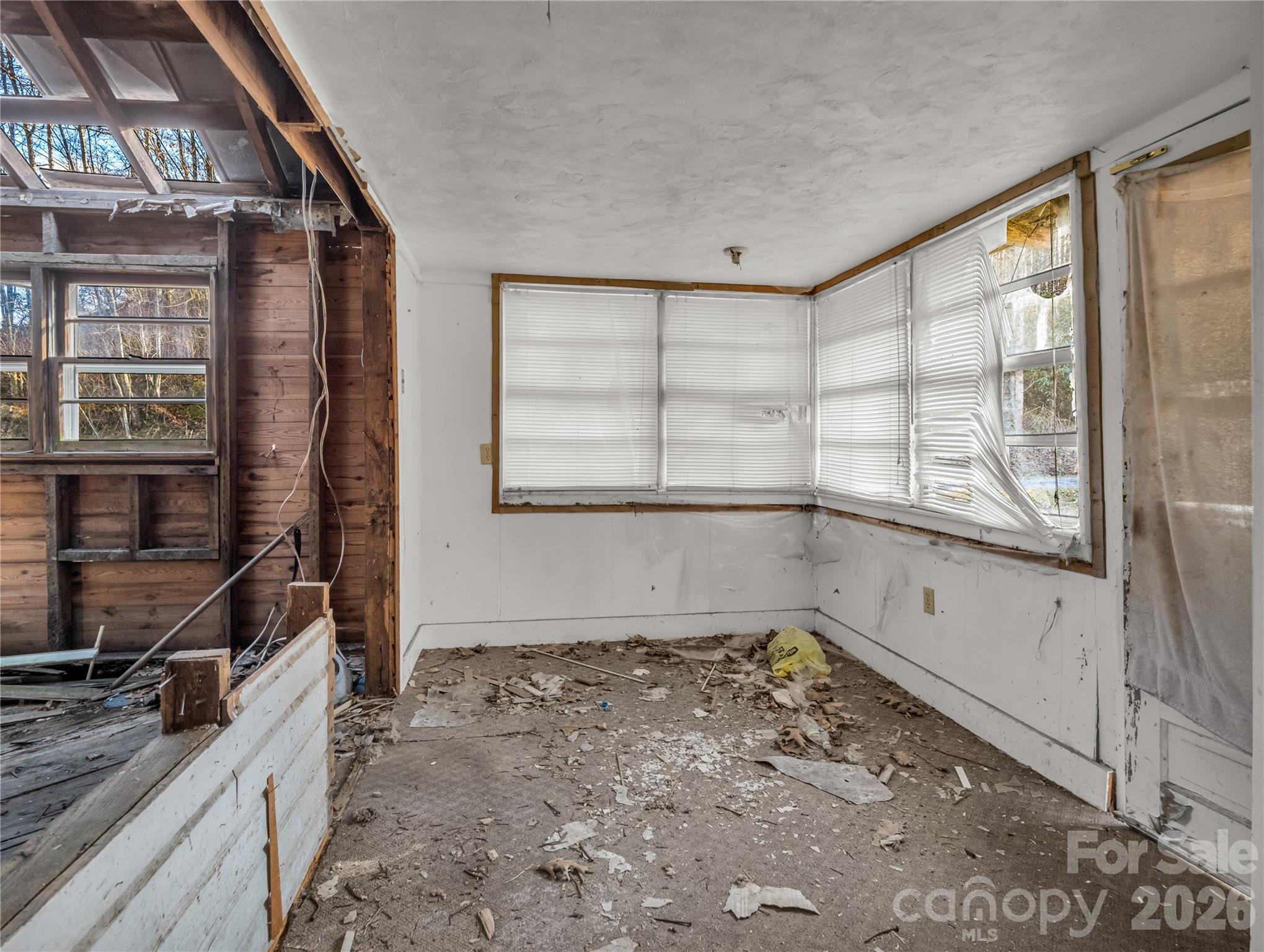 530 Mine Creek Road Bakersville, NC 28705 - Photo 11 of 18 a view of a storage & utility room in a house