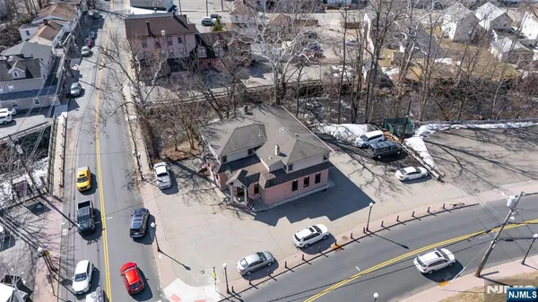an aerial view of a house with outdoor space