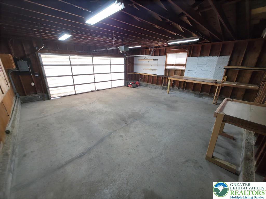 719 Keystone Avenue Bethlehem, PA 18018 - Photo 27 of 32 A spacious, naturally illuminated garage offers ample storage and workbench space.