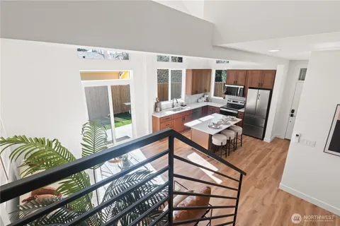 a view of a balcony dining area with furniture