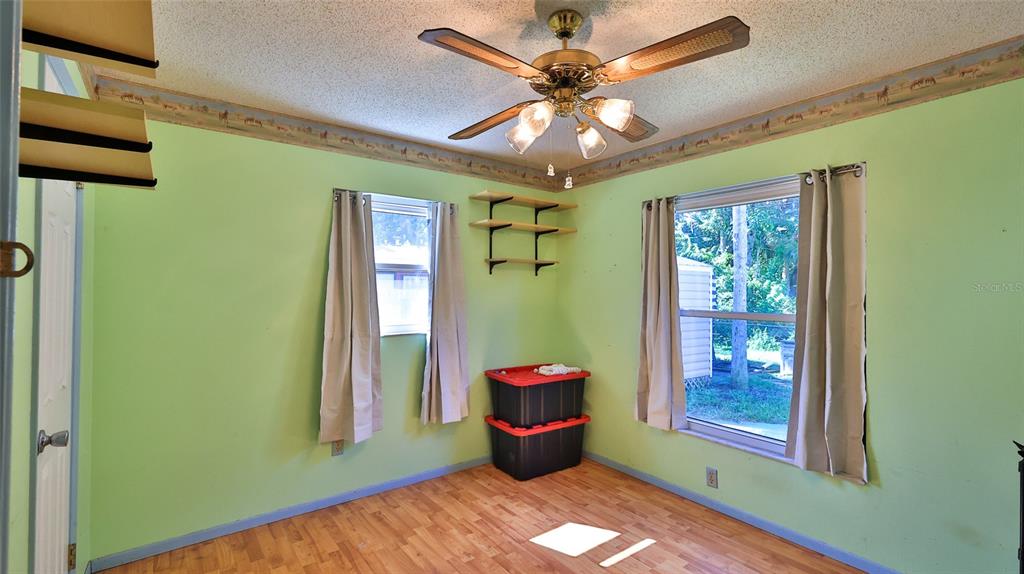 428 Perdita Avenue Edgewater, FL 32132 - Photo 19 of 28 a view of an entryway with a chandelier