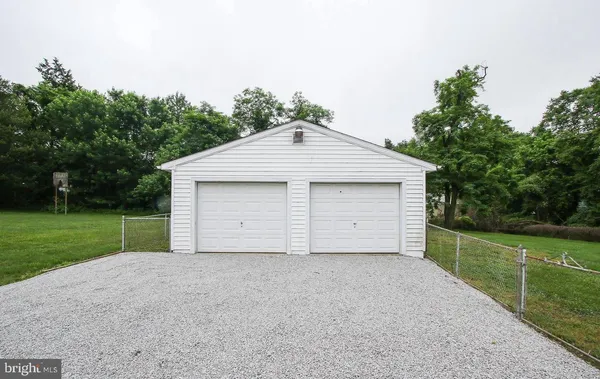 a front view of a house with yard