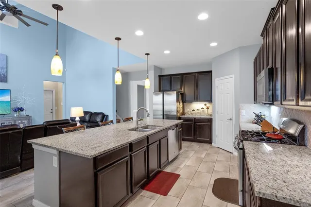 a kitchen with granite countertop lots of counter top space