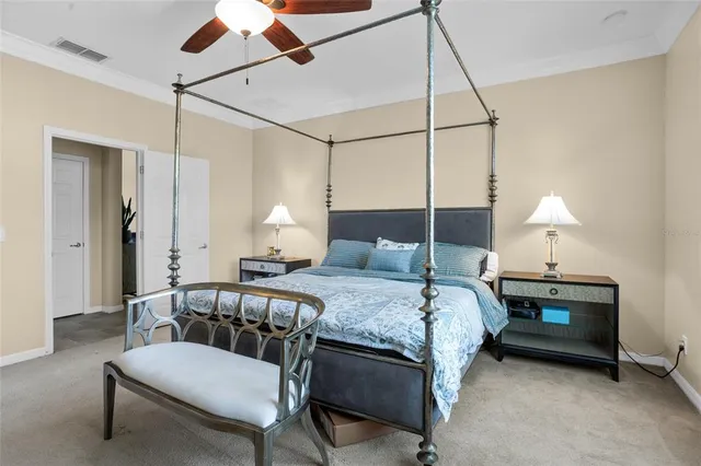 a bathroom with a tub a sink and a mirror