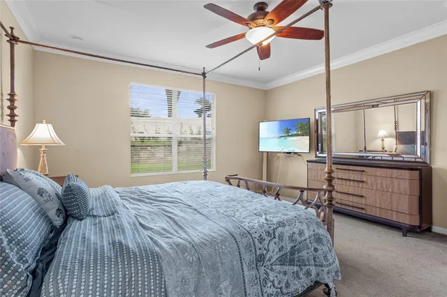 a spacious bathroom with a tub shower and window