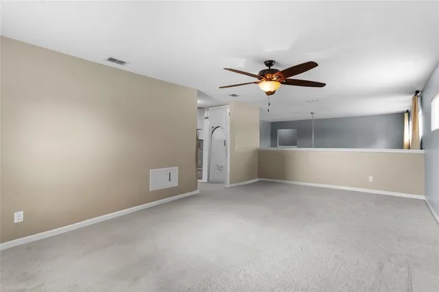 an aerial view of a swimming pool patio and mountain view