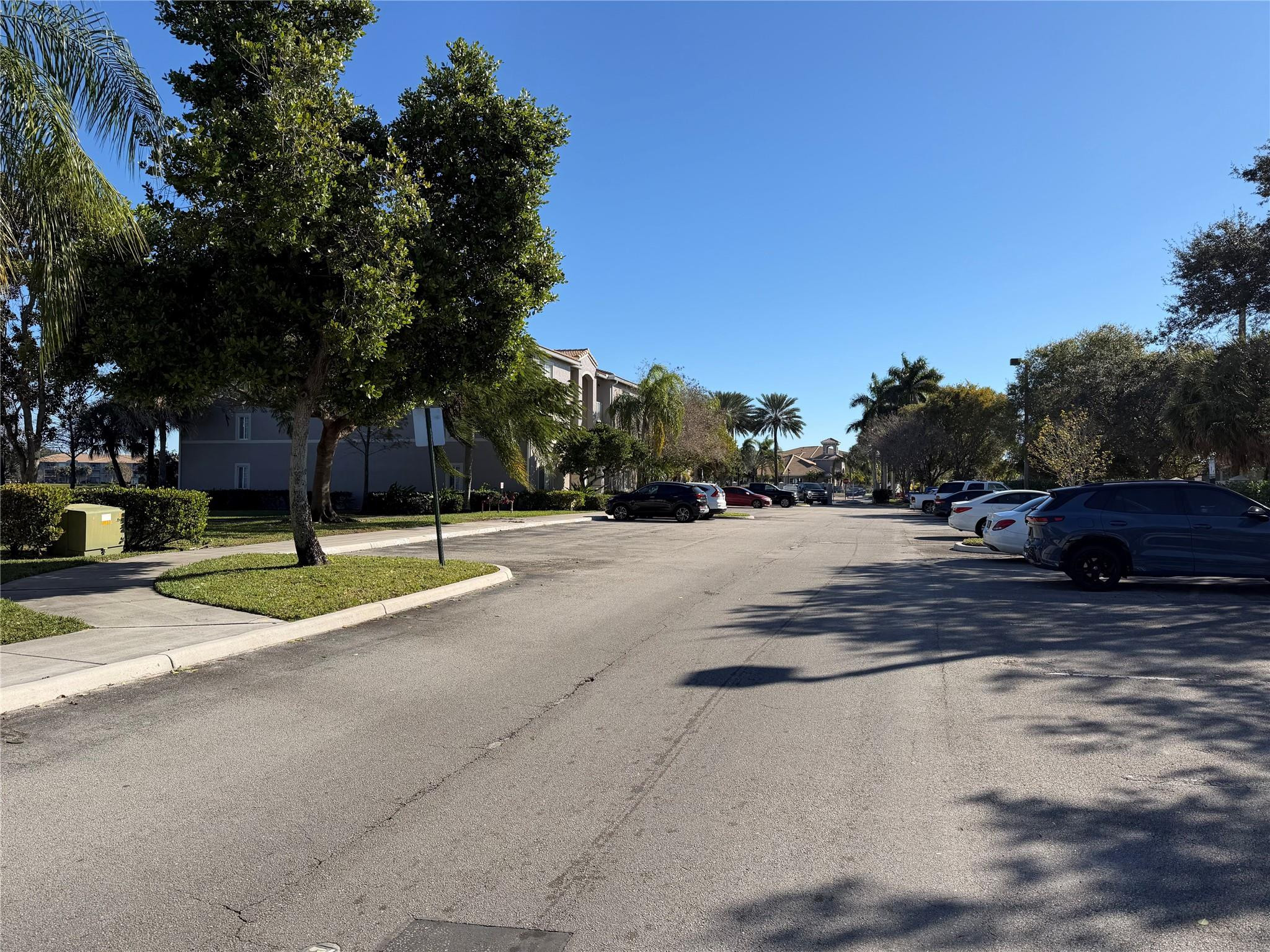 5005 Wiles Road, Unit 307 Pompano Beach, FL 33073 - Photo 28 of 28 a view of a playground with basketball court