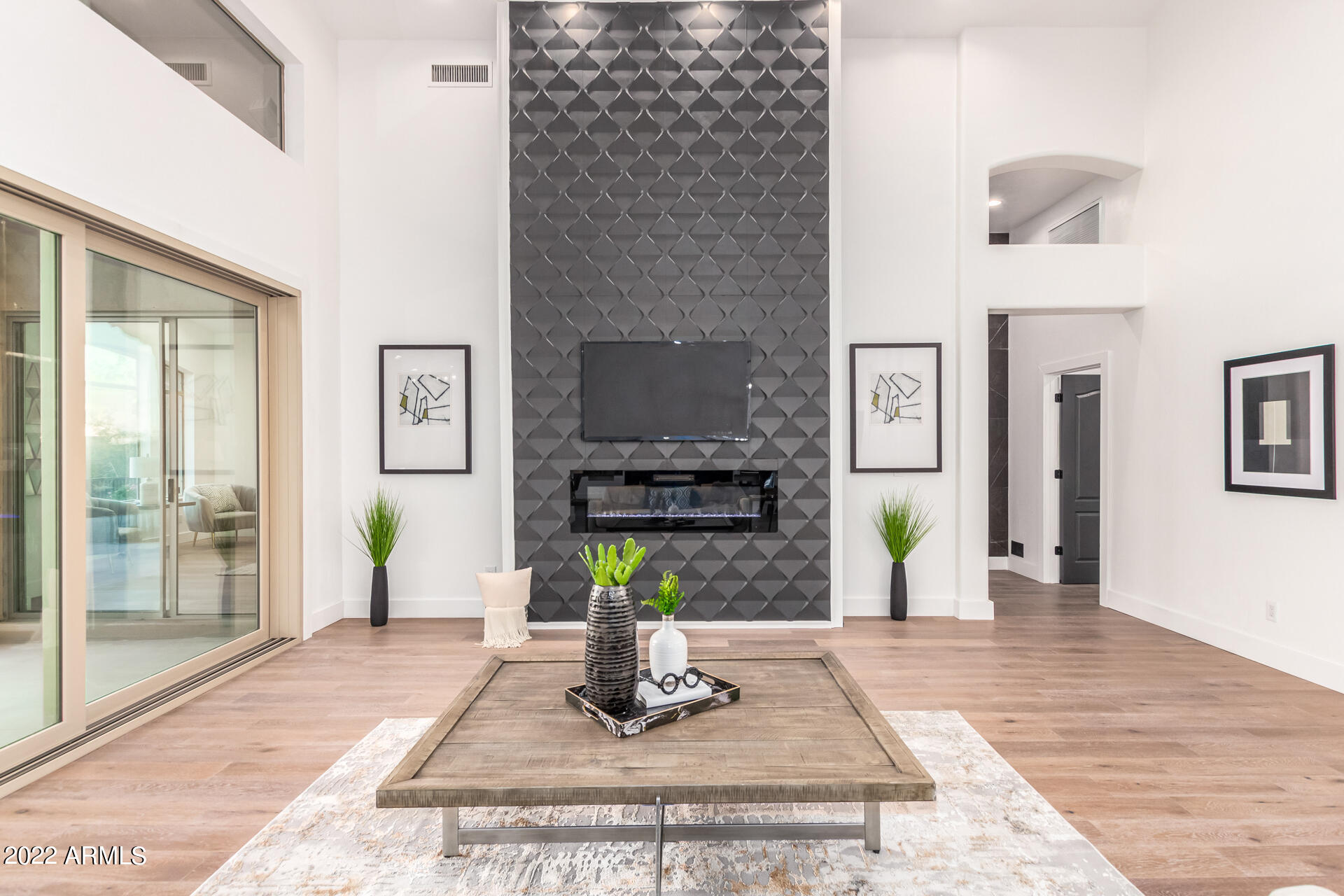 13607 East Geronimo Road Scottsdale, AZ 85259 - Photo 13 of 85 Feature wall with electric fireplace.