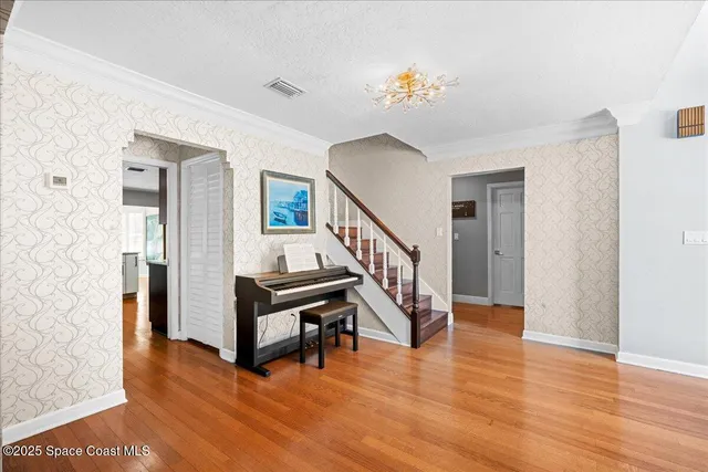 a kitchen with a sink and a microwave