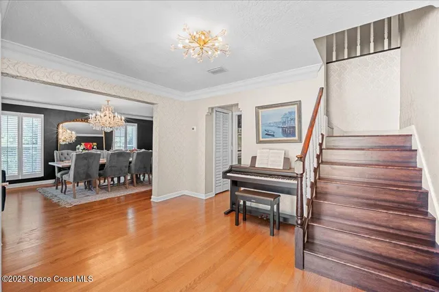 a kitchen with stainless steel appliances kitchen island granite countertop a refrigerator and a stove