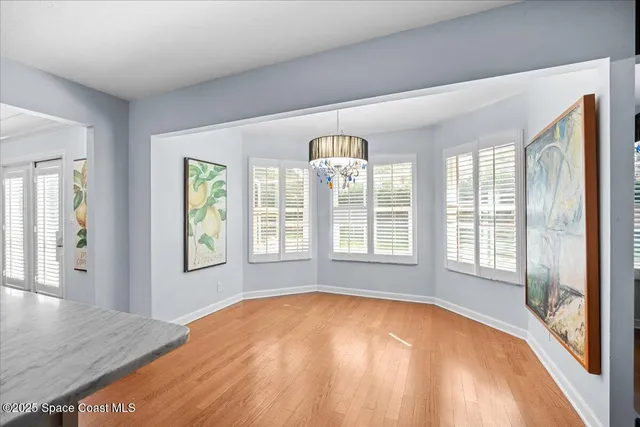 a bathroom with a toilet a sink and a mirror