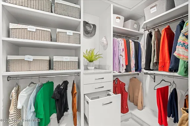 an aerial view of a house with outdoor space and street view