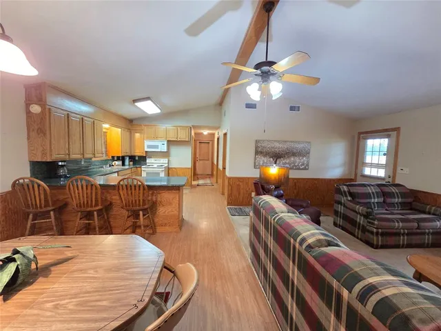 a view of a bathroom with wooden floor