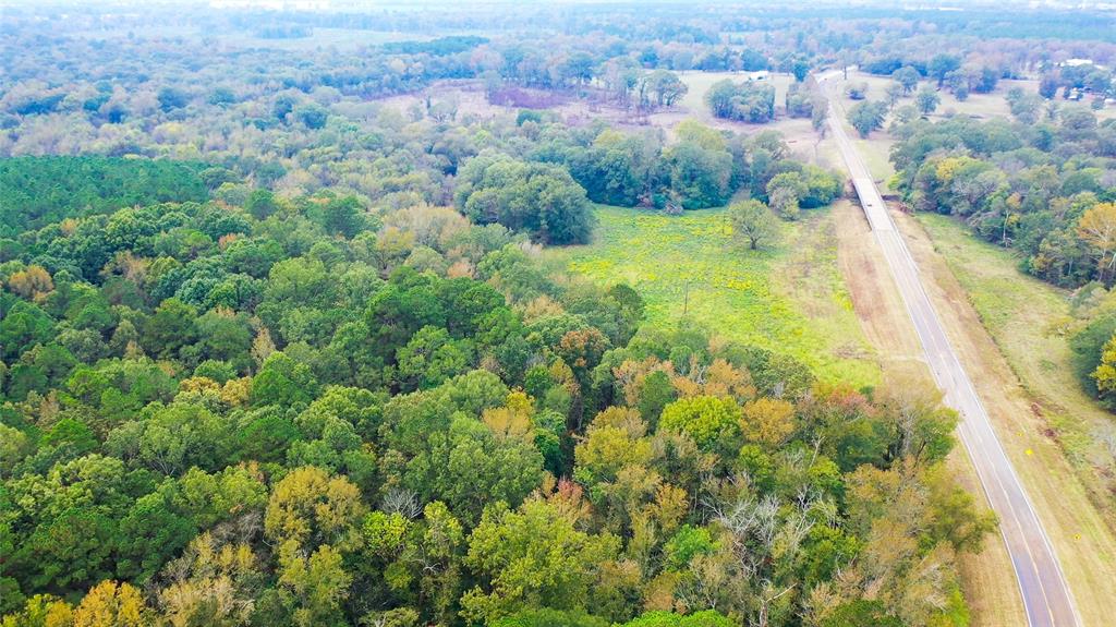 5015 561st Road Simms, TX 75574 - Photo 26 of 33 an aerial view of residential houses with outdoor space and trees