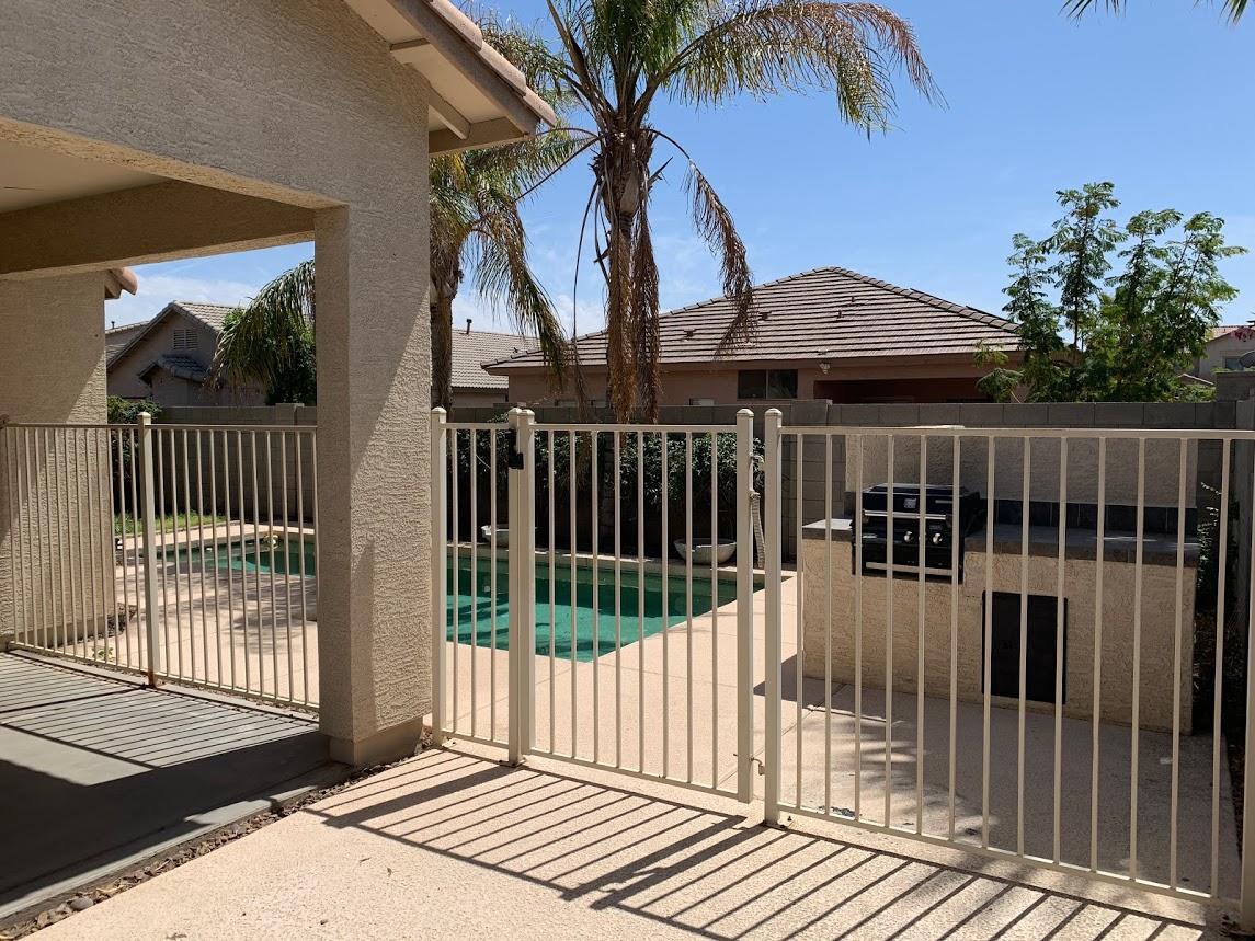 14641 West Hearn Road Surprise, AZ 85379 - Photo 32 of 42 a view of a house with a roof deck