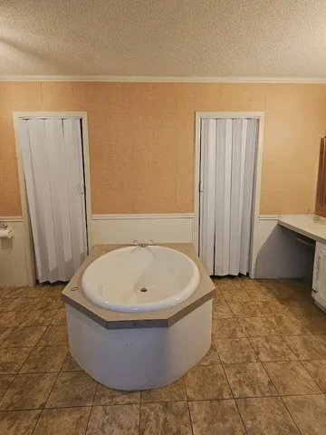a view of a bathtub in a bathroom
