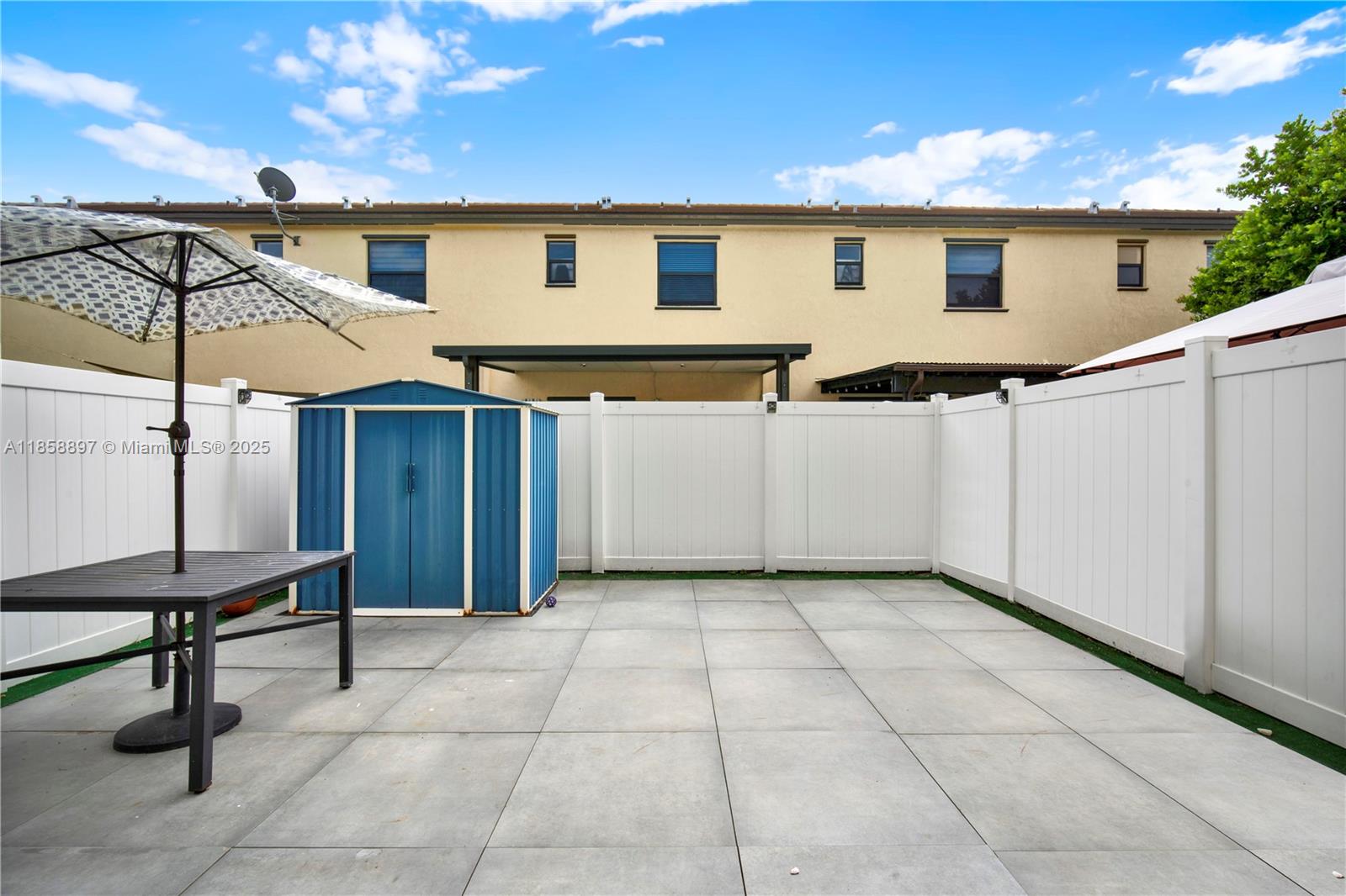 10480 West 33rd Lane Hialeah, FL 33018 - Photo 15 of 53 a view of a house with backyard and trees