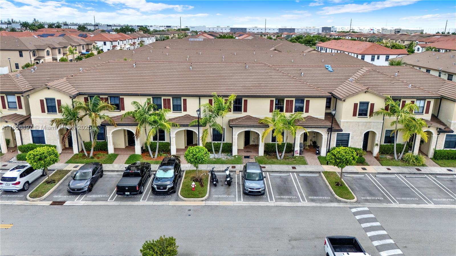 10480 West 33rd Lane Hialeah, FL 33018 - Photo 4 of 53 an aerial view of multiple houses with a street