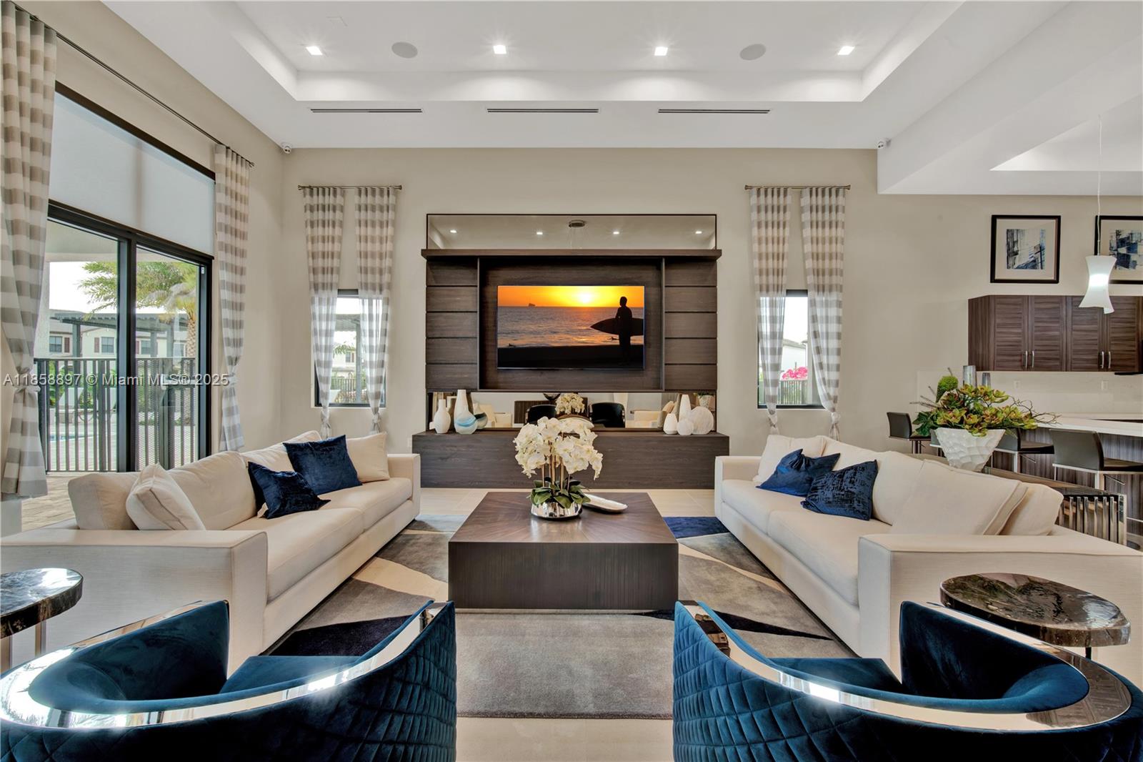 10480 West 33rd Lane Hialeah, FL 33018 - Photo 43 of 53 a living room with furniture and a flat screen tv