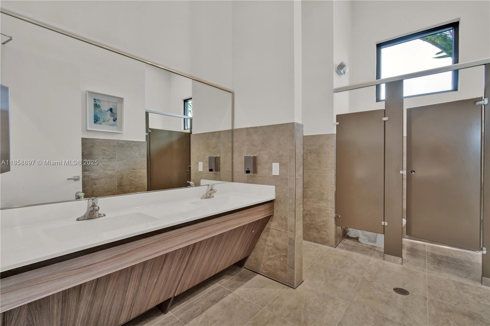 10480 West 33rd Lane Hialeah, FL 33018 - Photo 44 of 53 a bathroom with a double vanity sink mirror and shower