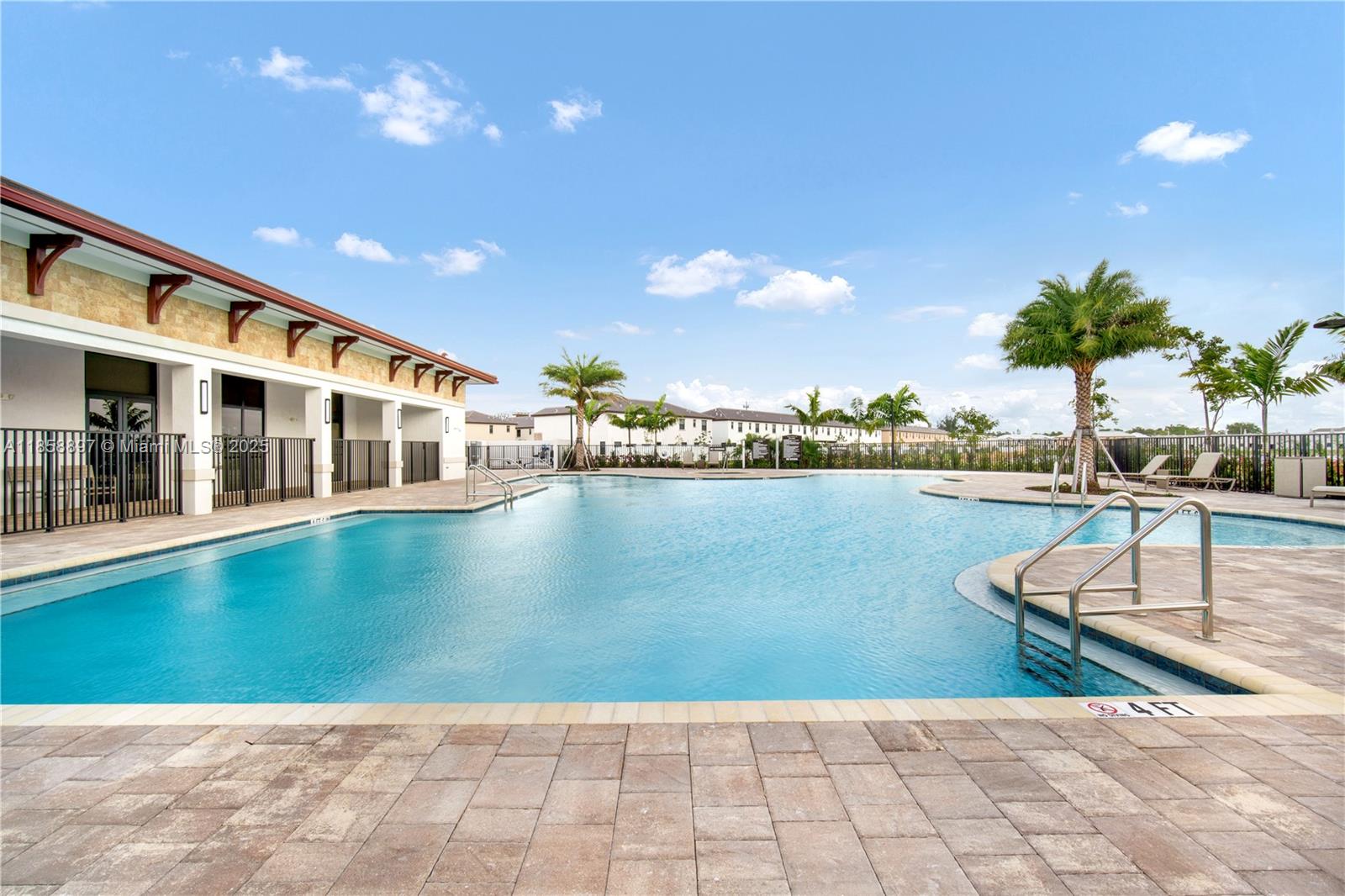 10480 West 33rd Lane Hialeah, FL 33018 - Photo 45 of 53 a view of a swimming pool and lounge chair