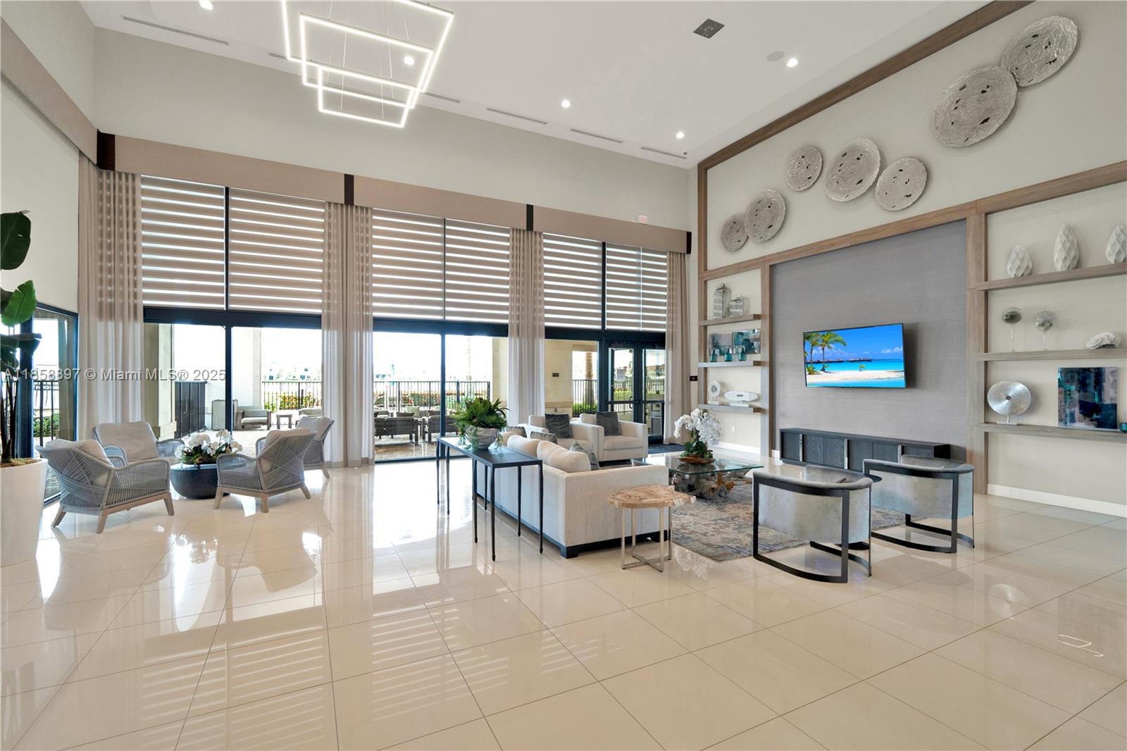 10480 West 33rd Lane Hialeah, FL 33018 - Photo 48 of 53 a living room with furniture and a large window
