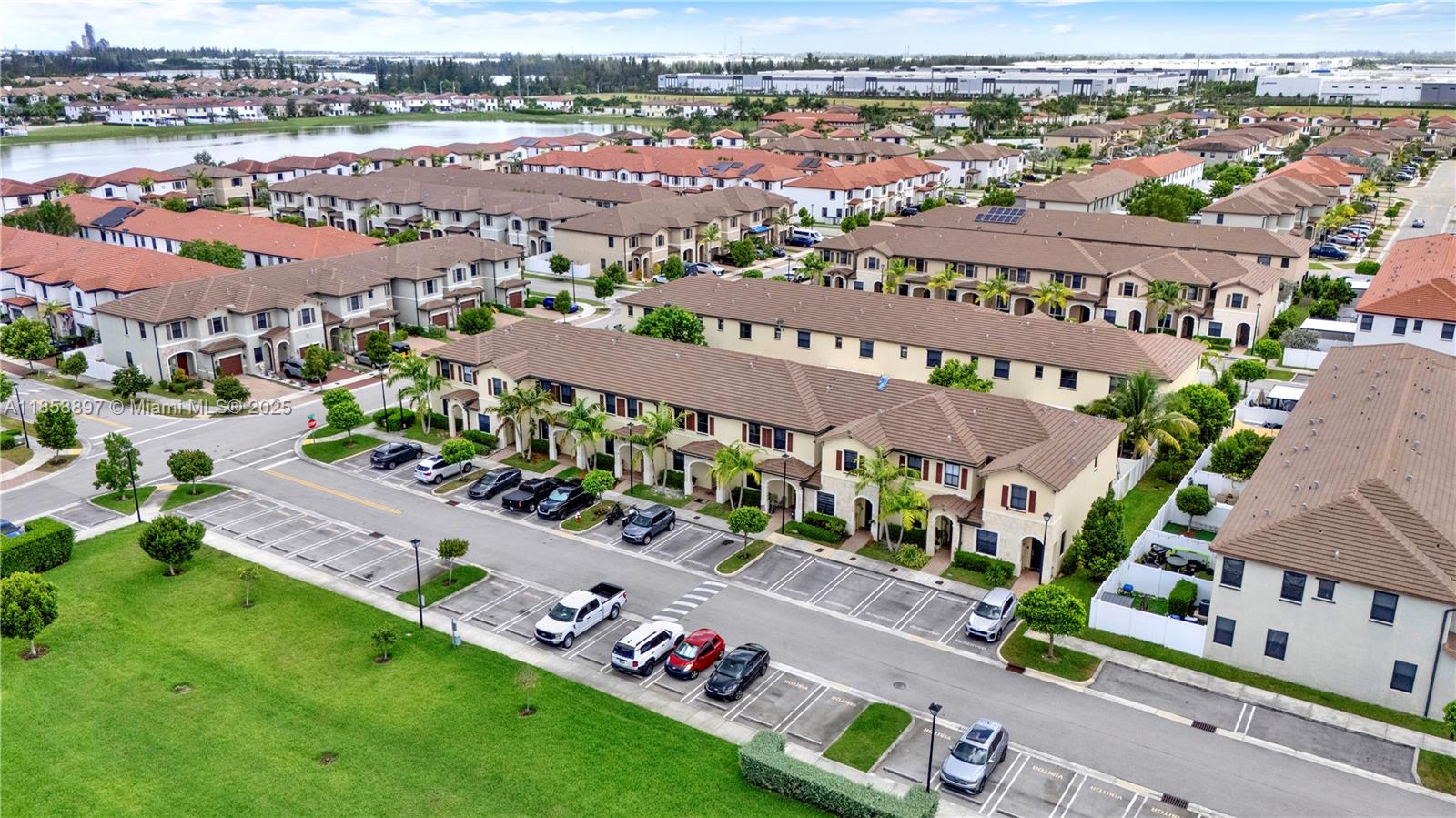 10480 West 33rd Lane Hialeah, FL 33018 - Photo 5 of 53 an aerial view of a city with lots of residential buildings ocean and mountain view in back