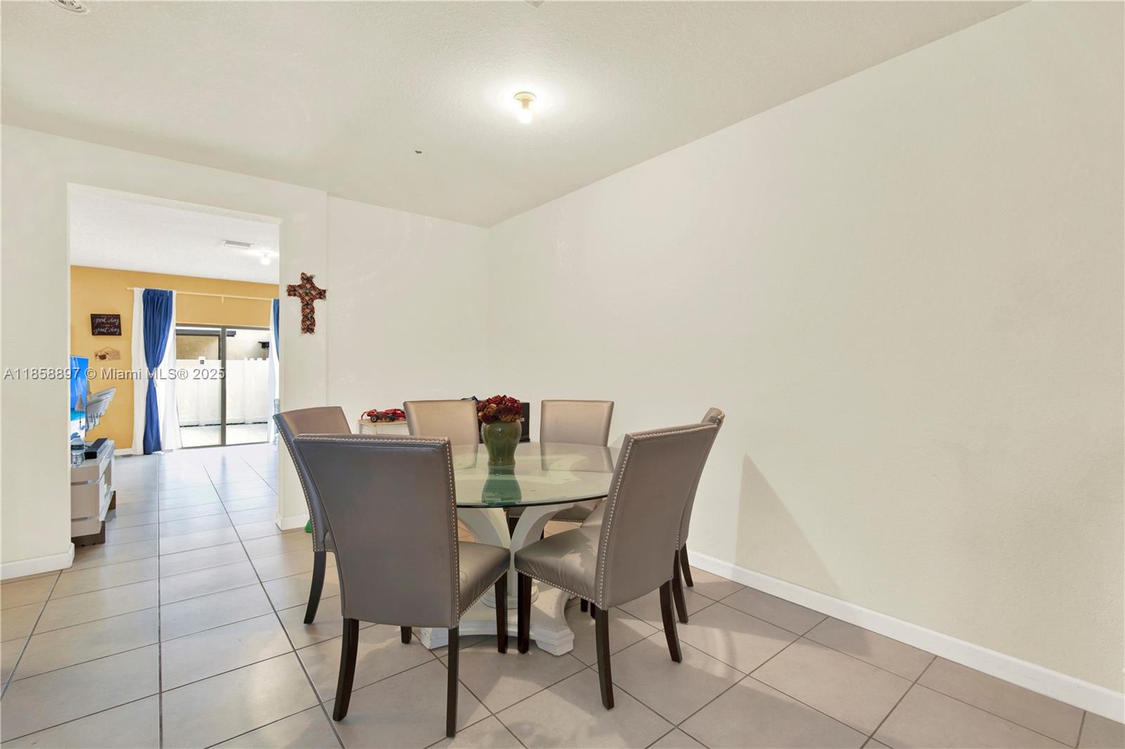 10480 West 33rd Lane Hialeah, FL 33018 - Photo 9 of 53 a view of a dining room with furniture