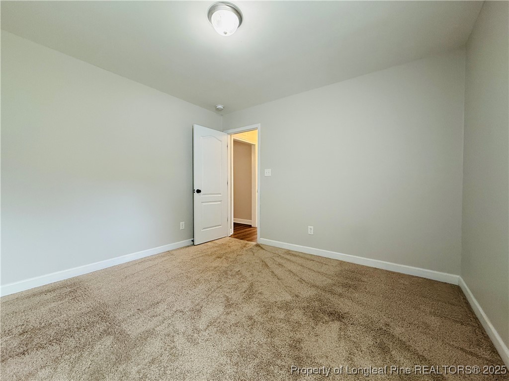 193 Bayleaf Drive Raeford, NC 28376 - Photo 17 of 25 an empty room with an entryway