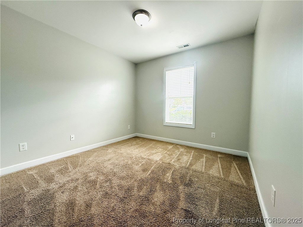 193 Bayleaf Drive Raeford, NC 28376 - Photo 20 of 25 an empty room with a window