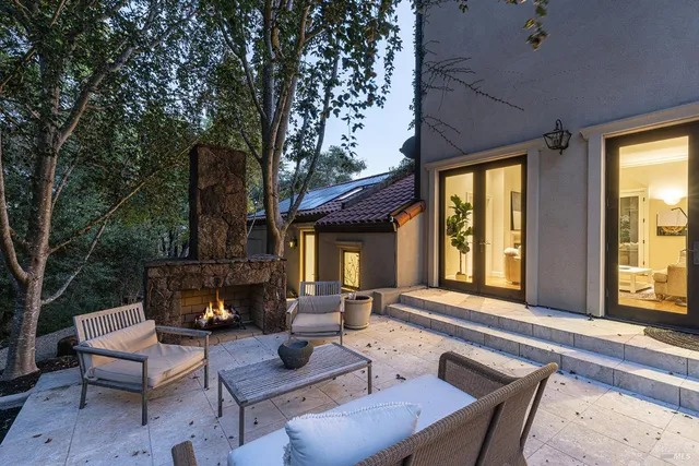 a bedroom with a bed and a television