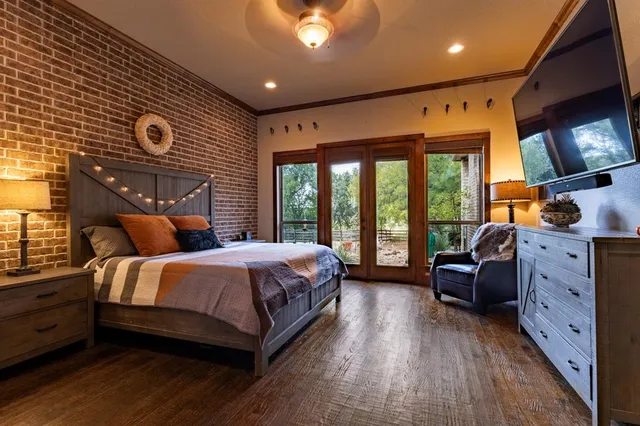 a bedroom with a bed and a couch