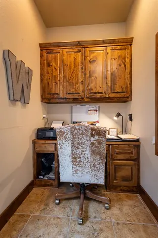 a picture of a bench in a room