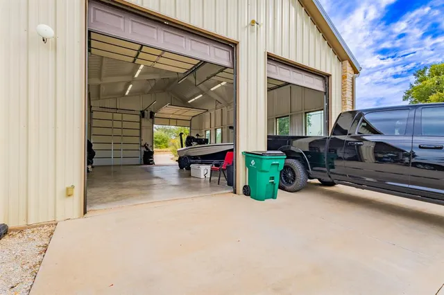 a view of backyard with cabin