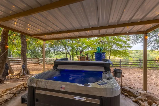a living room with a large window with yard view