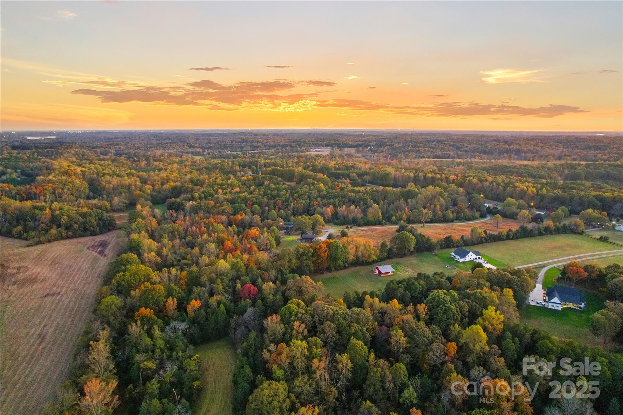 213 Rustic Road Mooresville, NC 28115 - Photo 4 of 12 a view of a city with mountains in the background