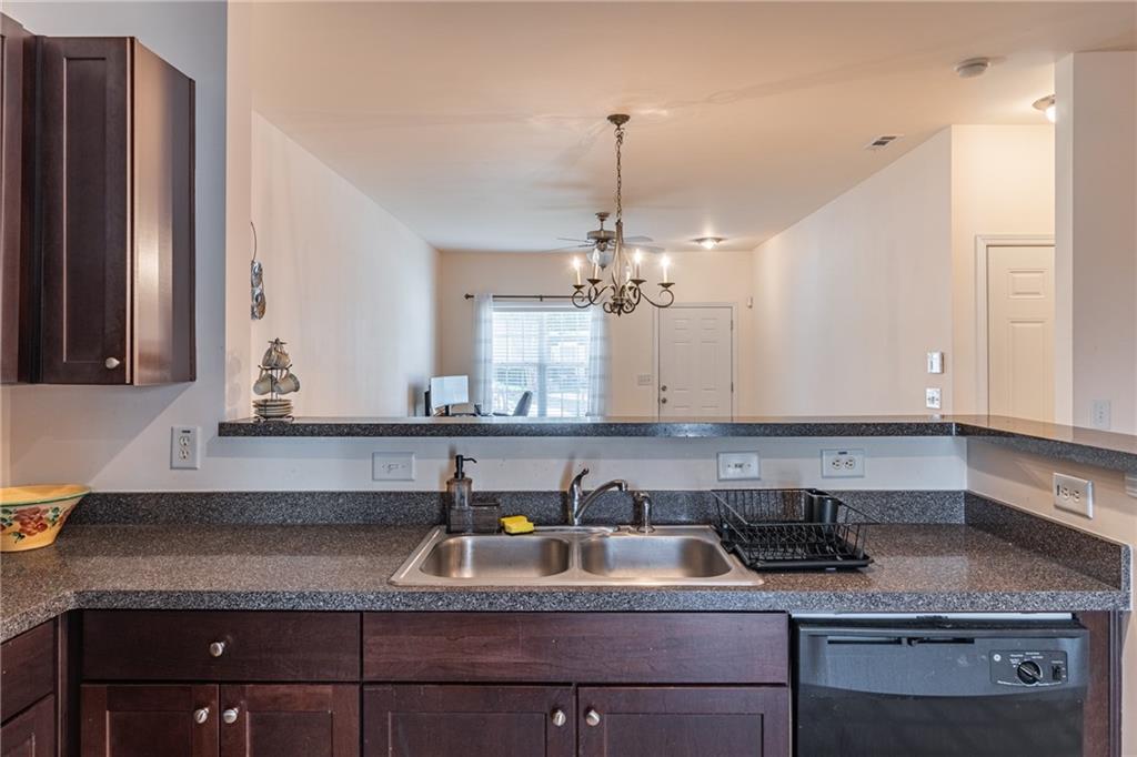 2182 Hyssop Way Buford, GA 30519 - Photo 9 of 16 a kitchen with a sink cabinets and window