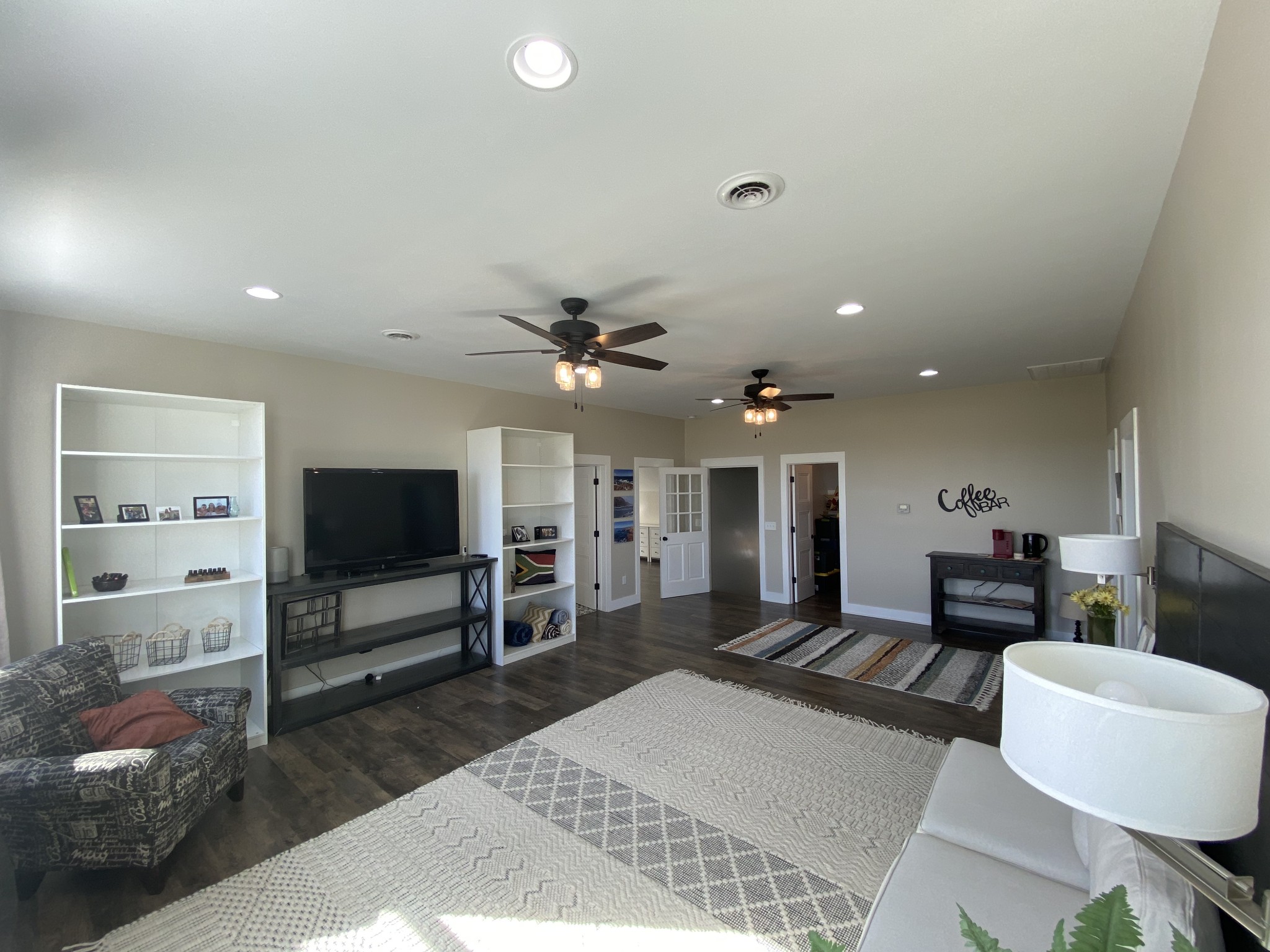 1259 Martin Road Morrison, TN 37357 - Photo 36 of 68 a living room with furniture a flat screen tv and kitchen view