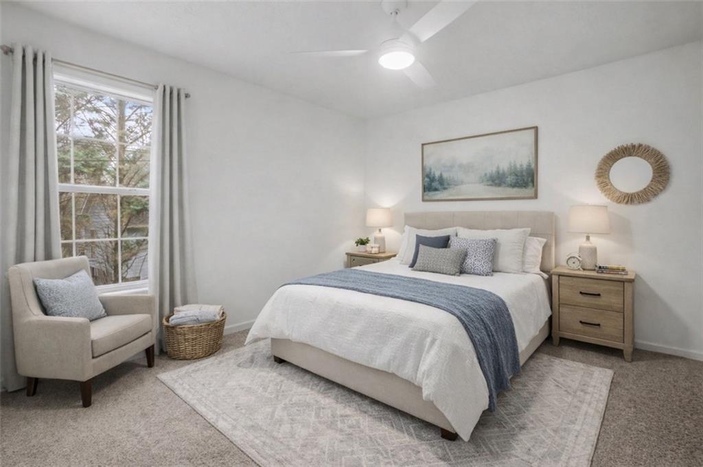 520 Victoria Road Woodstock, GA 30189 - Photo 24 of 42 a bedroom with bed and furniture