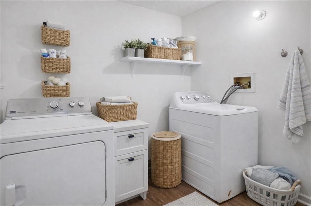 520 Victoria Road Woodstock, GA 30189 - Photo 32 of 42 a utility room with dryer and washer