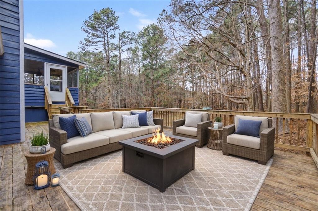 520 Victoria Road Woodstock, GA 30189 - Photo 34 of 42 a view of a patio with couches and potted plants